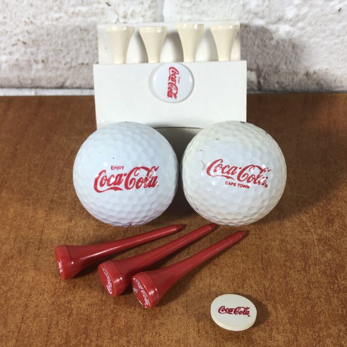 Lot 106: Coca Cola Golf Ball & Tee Set