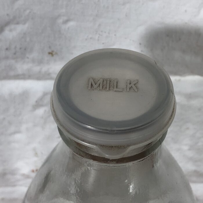 Vintage Glass Milk Bottles in Holder - Image 3