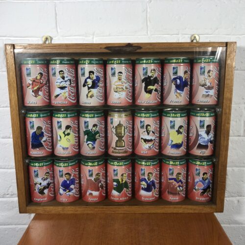 Framed Collection of Coca Cola 1999 Rugby World Cup Cans