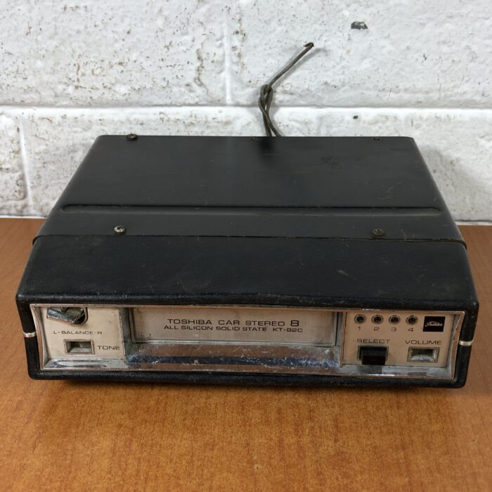 Vintage Car Stereo with 8-Track Tapes - Image 2
