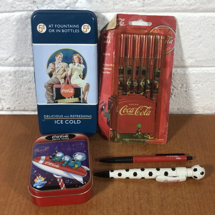 Lot 29: Coca Cola Pencil Cases & Pens