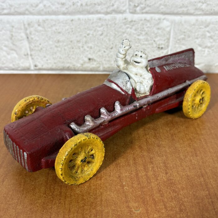 Lot 58: Vintage Hubley 1930s Cast Iron Michelin Man Racing Car Model