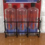 Vintage Total Glass Bottles in Modern Display Stand - Image 3