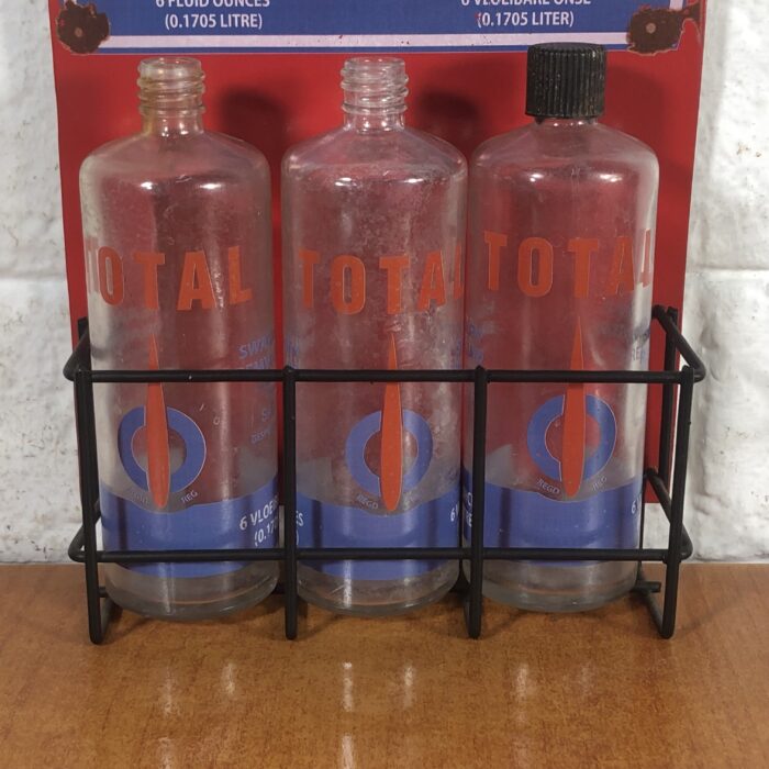 Vintage Total Glass Bottles in Modern Display Stand - Image 3
