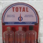 Vintage Total Glass Bottles in Modern Display Stand - Image 2