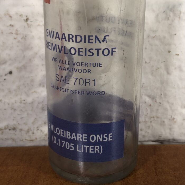 Vintage Total Glass Bottles in Modern Display Stand - Image 5