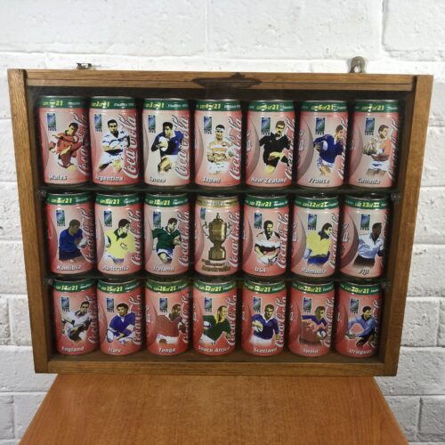 Framed Collection of Coca Cola 1999 Rugby World Cup Cans