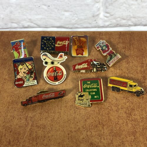 Collection of Coca Cola Badges
