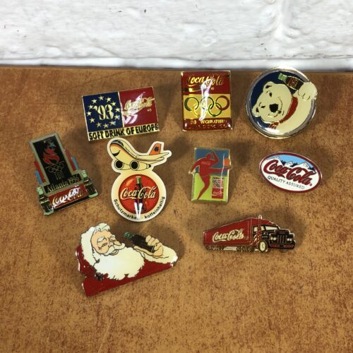 Collection of Coca Cola Badges